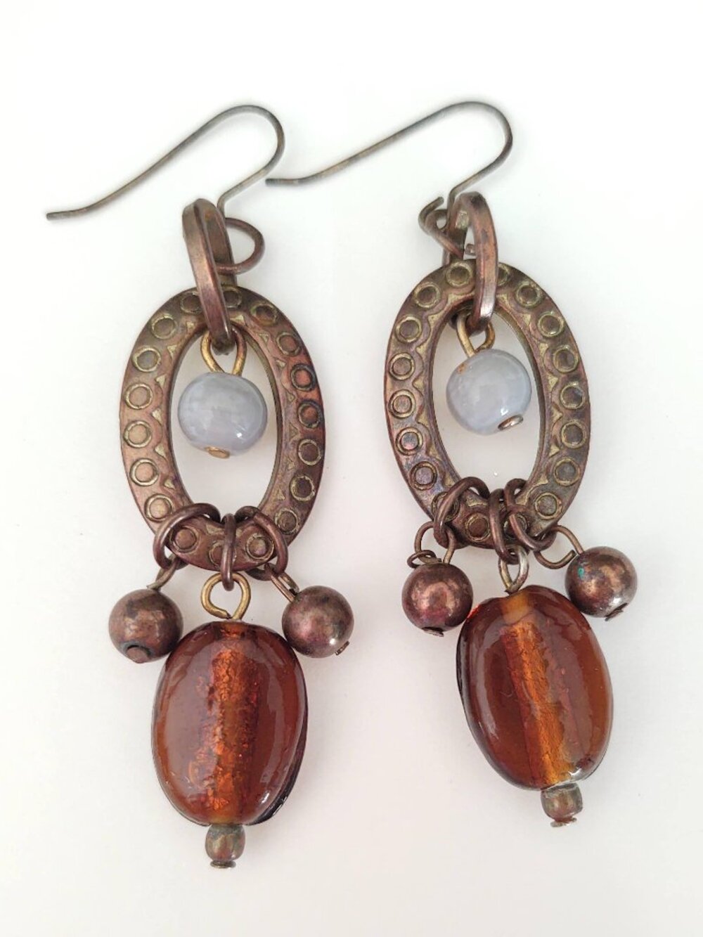 Glass and metal dangle earrings